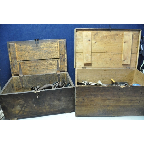 1053 - TWO WOODEN TOOLCHESTS CONTAINING VINTAGE TOOLS to include files, marking tools, saws, saw blades, ha... 