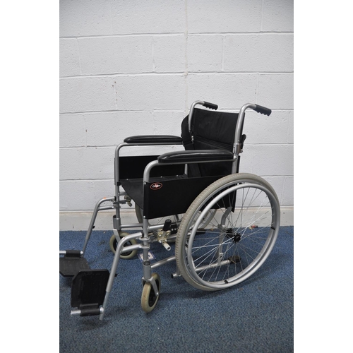 1109 - A ENIGMA LAWC001 self propelled wheelchair with footrests and seat belt (condition- good used condit... 