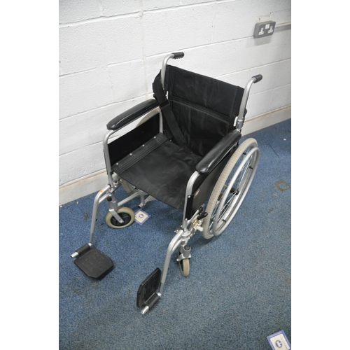 1109 - A ENIGMA LAWC001 self propelled wheelchair with footrests and seat belt (condition- good used condit... 