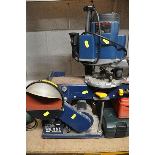 1126 - A TITAN TTB045BTS BELT AND DISC SANDER along with a Nutool 1in belt sander and a Ryobi RE601 industr... 