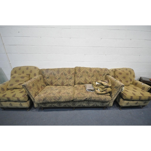1292 - A THREE PIECE LOUNGE SUITE, comprising a three seater sofa with floral upholstery, length 224cm, and... 
