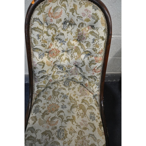 1293 - A VICTORIAN ROSEWOOD NURSING CHAIR, with floral upholstery (condition - slight splits to joins)