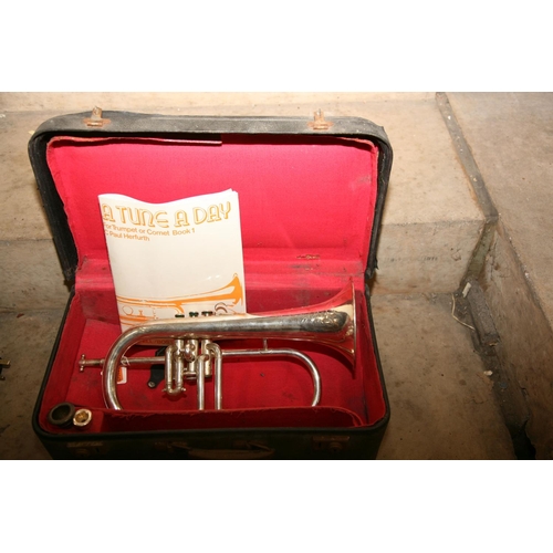 881 - A BESSON AND CO CORNET with silver coloured finish, mouthpiece in leather case and an instrument cas... 