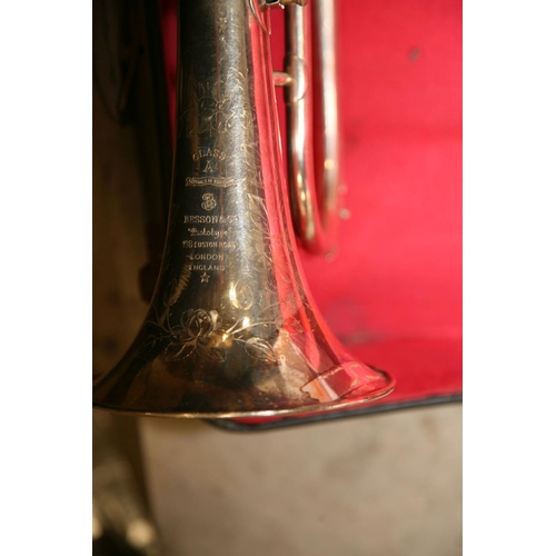 881 - A BESSON AND CO CORNET with silver coloured finish, mouthpiece in leather case and an instrument cas... 