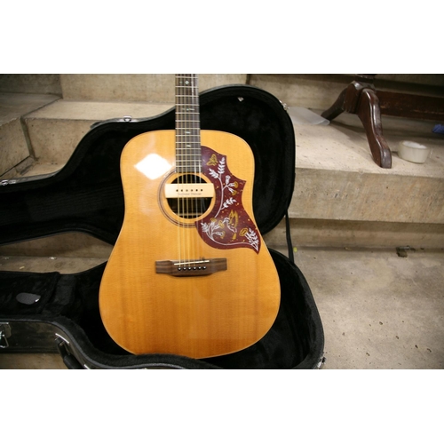 886 - A FRESHMAN FA-400D ACOUSTIC GUITAR with rosewood fingerboard, back and sides, mother of pearl fret m... 