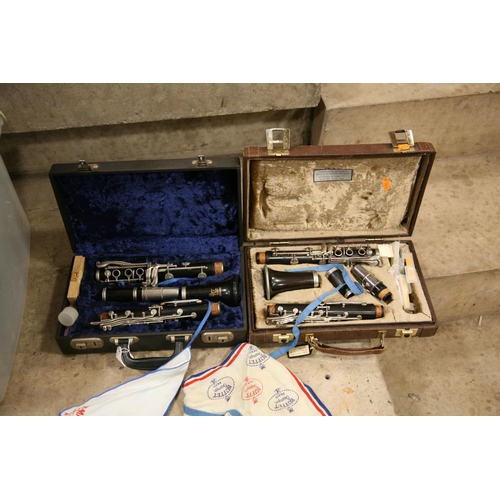 889 - TWO CASED CLARINETS one a Crompton and Co Buffet, Paris mouthpiece marked 5RV and a Boosey and Hawke... 