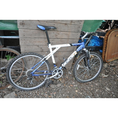 1002 - A BLUE/BLACK AND WHITE GT AGGRESSOR TRIPLE TRIANGLE GENTLEMANS BICYCLE, with a 20   frame, Shimano G... 