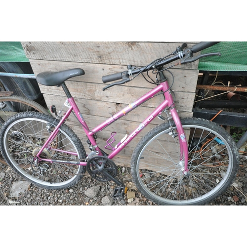 1005 - A PURPLE APOLLO INDEX LADIES BICYCLE, with a 19   frame and Shimano 18 speed