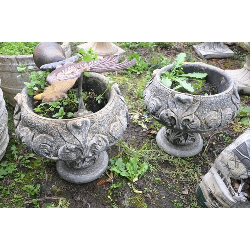 1011 - A PAIR OF COMPOSITE TWO PIECE GARDEN URNS with foliate detail to bowl and base height 33cm and a wal... 