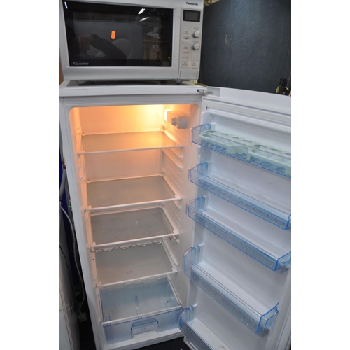 1061 - A BEKO LX5095W TALL FRIDGE measuring width 54cm x depth 58cm x height 144cm (PAT pass and working), ... 