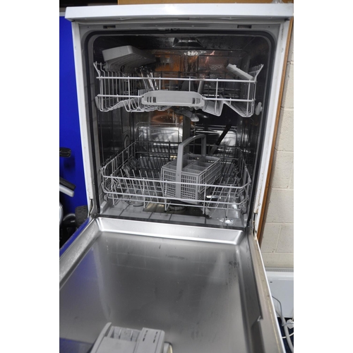 1066 - A BOSCH SMS40T32UK DISHWASHER measuring width 60cm x depth 62cm x height 84cm (PAT pass and powers u... 