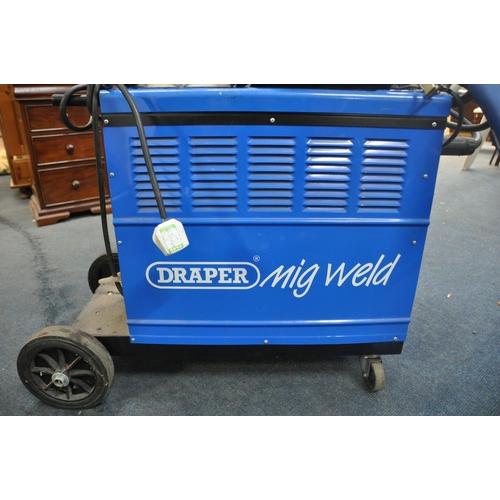 1074 - A DRAPER MW180TI MIG WELDER (PAT pass and powers up) with two welding masks, along with a quantity o... 