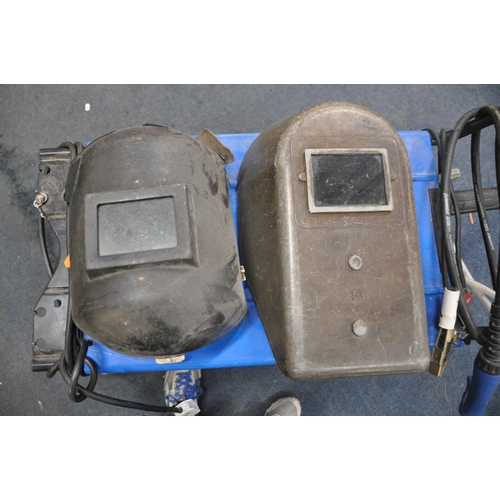 1074 - A DRAPER MW180TI MIG WELDER (PAT pass and powers up) with two welding masks, along with a quantity o... 