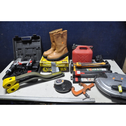 1075 - A SELECTION OF MISCELLANEOUS to include three steering locks, petrol can, two pairs of steel toe cap... 