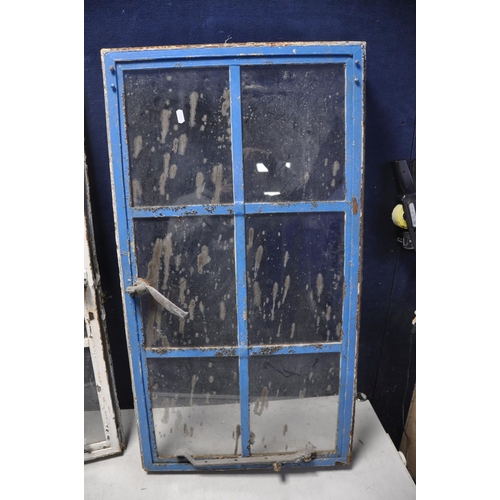 1097 - A PAIR OF EARLY 20TH CENTURY METAL FRAMED WINDOW INSERTS measuring width 51cm x height 94cm