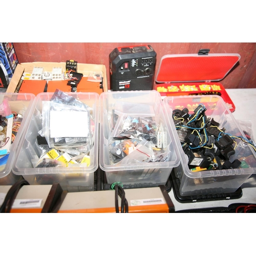 1104 - A COLLECTION OF ELECTRONIC PARTS AND TOOLS including two Unilab Bench Power Supplies, five trays of ... 