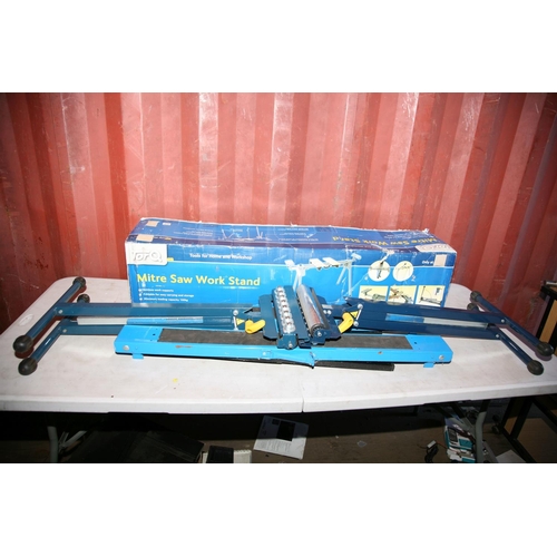 1125 - A TORQ MITRE SAW WORK STAND, a pair of metal folding trestle stands and a pair of folding roller sta... 