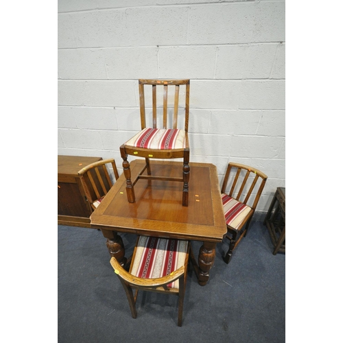 1206 - A 20TH CENTURY OAK EXTENDING DINING TABLE, on acorn legs, united by shaped stretchers, open length 1... 