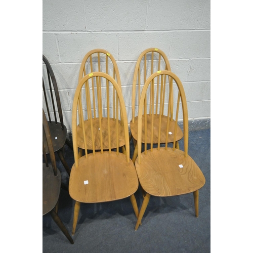 1217 - A SET OF EIGHT ELM SEATED ERCOL QUAKER WINDSOR STYLE CHAIRS, Including one carver, four stained and ... 