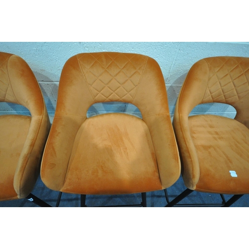 1225 - A SET OF THREE RUSTY ORANGE BAR STOOLS, on metal legs, width 53cm x depth 51cm x height 102cm (3)