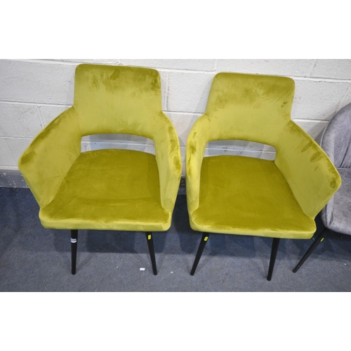 1226 - A PAIR OF GREEN MMILO ARMCHAIRS, a pair of grey tub chairs, and a table with metal legs (4)