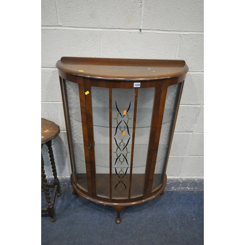 1239 - A MID CENTURY WALNUT DEMI LUNE SINGLE DOOR DISPLAY CABINET, with two glass shelves, on cabriole legs... 