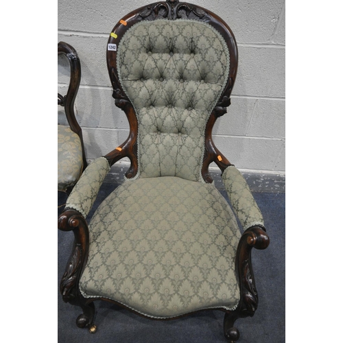 1242 - A VICTORIAN WALNUT BUTTONED SPOON BACK OPEN ARMCHAIR, with green floral upholstery, on carved front ... 