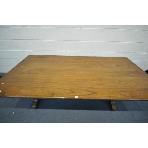 1245 - A REFECTORY STYLE ELM EFFECT DINING TABLE, on trestle legs, with wrought iron stretchers, length 241... 