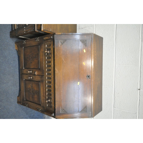 1256 - A 20TH CENTURY OAK BLANKET BOX, with a single hinged top, three paneled archways to front, width 107... 