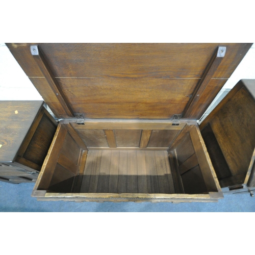 1256 - A 20TH CENTURY OAK BLANKET BOX, with a single hinged top, three paneled archways to front, width 107... 