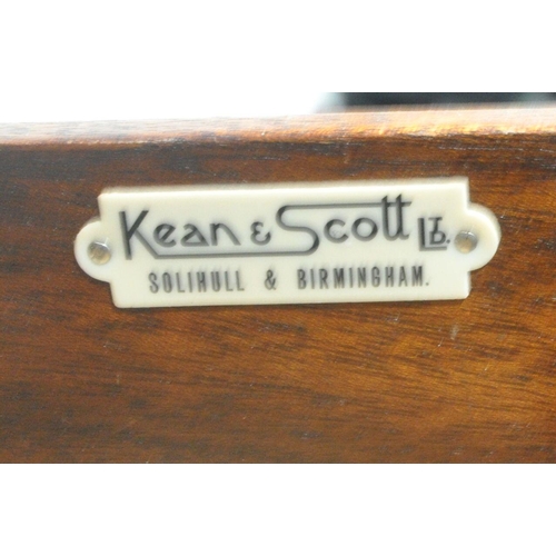 1257 - A KEAN AND SCOTT BURR WALNUT CABINET, with a single storage shelf and two drawers, on cabriole legs,... 