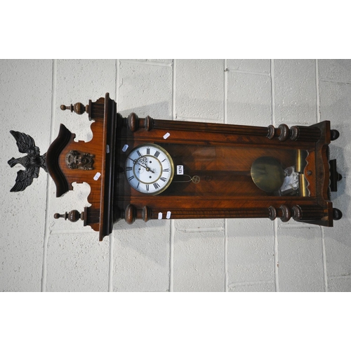 1274 - A 19TH CENTURY WALNUT CASED EIGHT DAY GUSTAV BECKER WALL CLOCK, the pediment depicting an eagle, abo... 