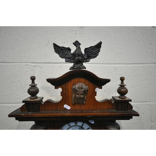 1274 - A 19TH CENTURY WALNUT CASED EIGHT DAY GUSTAV BECKER WALL CLOCK, the pediment depicting an eagle, abo... 