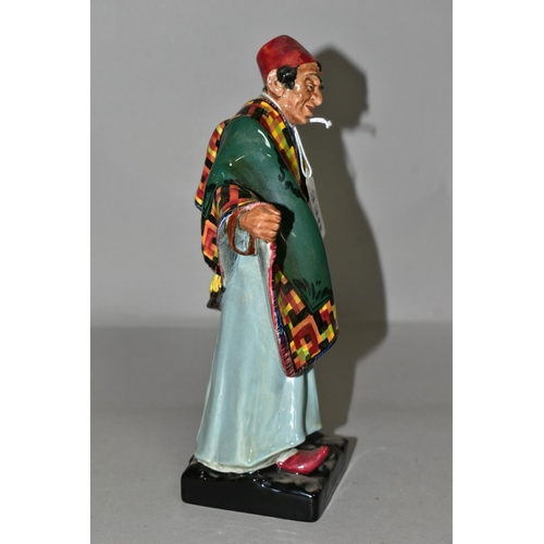 330 - A ROYAL DOULTON CARPET SELLER FIGURINE, HN1464, height 22.5cm, printed and impressed marks to base (... 