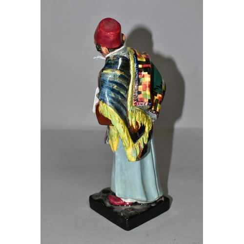 330 - A ROYAL DOULTON CARPET SELLER FIGURINE, HN1464, height 22.5cm, printed and impressed marks to base (... 