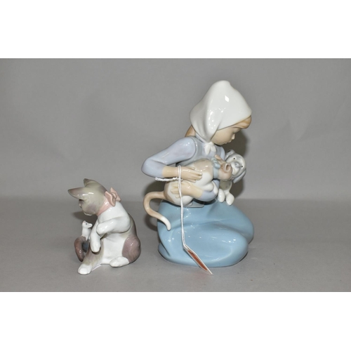 333 - TWO LLADRO FIGURINES, comprising Little Friskies, no 5032, introduced in 1979 and retired in 1997, s... 