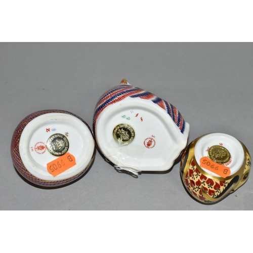 334 - THREE ROYAL CROWN DERBY PAPERWEIGHTS, all with gold stoppers, comprising Tiger Cub with date code fo... 