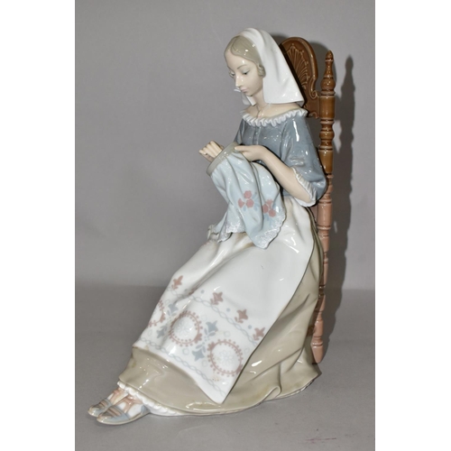 348 - A LLADRO FIGURE INSULAR EMBROIDERESS, NO. 4865, sculpted by Salvador Furio, issued 1974-1994, printe... 