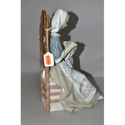 348 - A LLADRO FIGURE INSULAR EMBROIDERESS, NO. 4865, sculpted by Salvador Furio, issued 1974-1994, printe... 