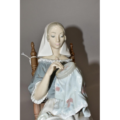 348 - A LLADRO FIGURE INSULAR EMBROIDERESS, NO. 4865, sculpted by Salvador Furio, issued 1974-1994, printe... 