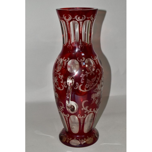 355 - A LATE 19TH CENTURY BOHEMIAN GLASS TWIN HANDLED BALUSTER VASE, ruby stained and cut to clear with fa... 