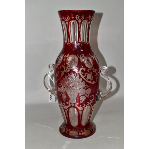 355 - A LATE 19TH CENTURY BOHEMIAN GLASS TWIN HANDLED BALUSTER VASE, ruby stained and cut to clear with fa... 