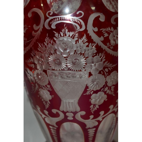 355 - A LATE 19TH CENTURY BOHEMIAN GLASS TWIN HANDLED BALUSTER VASE, ruby stained and cut to clear with fa... 