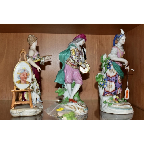 357 - THREE 19TH CENTURY CONTINENTAL PORCELAIN FIGURES, comprising a near pair of male and female musician... 