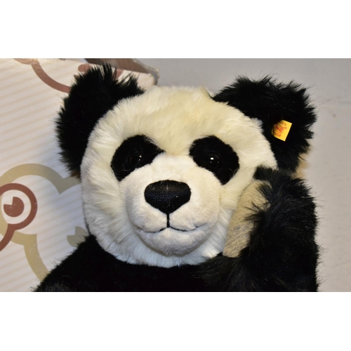 371 - A BOXED STEIFF 'PANDA TED', black and white acrylic mix, jointed, yellow label, model no.010637, wit... 