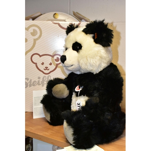 371 - A BOXED STEIFF 'PANDA TED', black and white acrylic mix, jointed, yellow label, model no.010637, wit... 