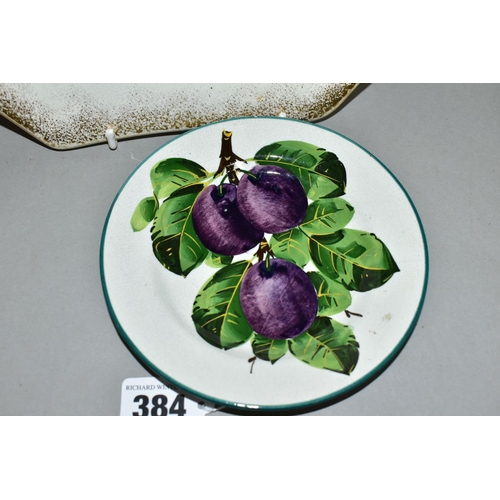 384 - A WEMYSS TEA PLATE DECORATED WITH PURPLE PLUMS, painted, printed and impressed marks, diameter 14.2c... 