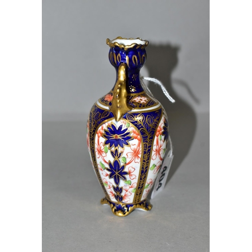 404 - A ROYAL CROWN DERBY OLD IMARI 1128 TWIN HANDLED VASE, of baluster form with gilt foliate handles, st... 