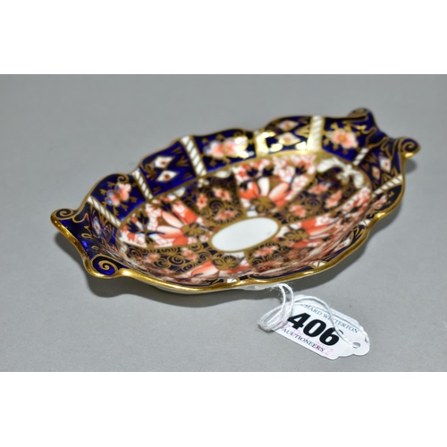 406 - A ROYAL CROWN DERBY IMARI 2451 TRINKET DISH, of scalloped oval form with scrolling handles, magenta ... 