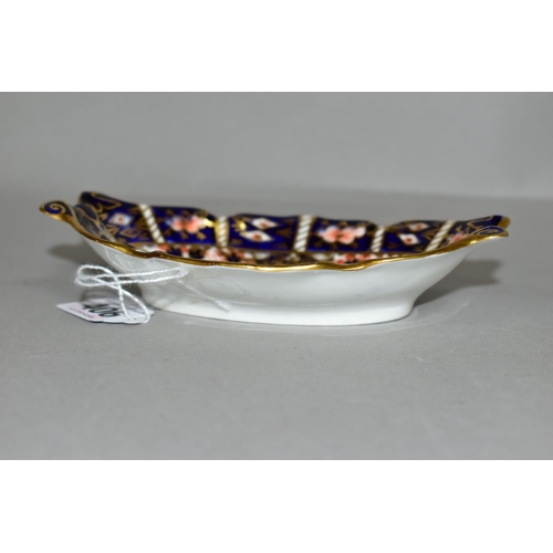 406 - A ROYAL CROWN DERBY IMARI 2451 TRINKET DISH, of scalloped oval form with scrolling handles, magenta ... 